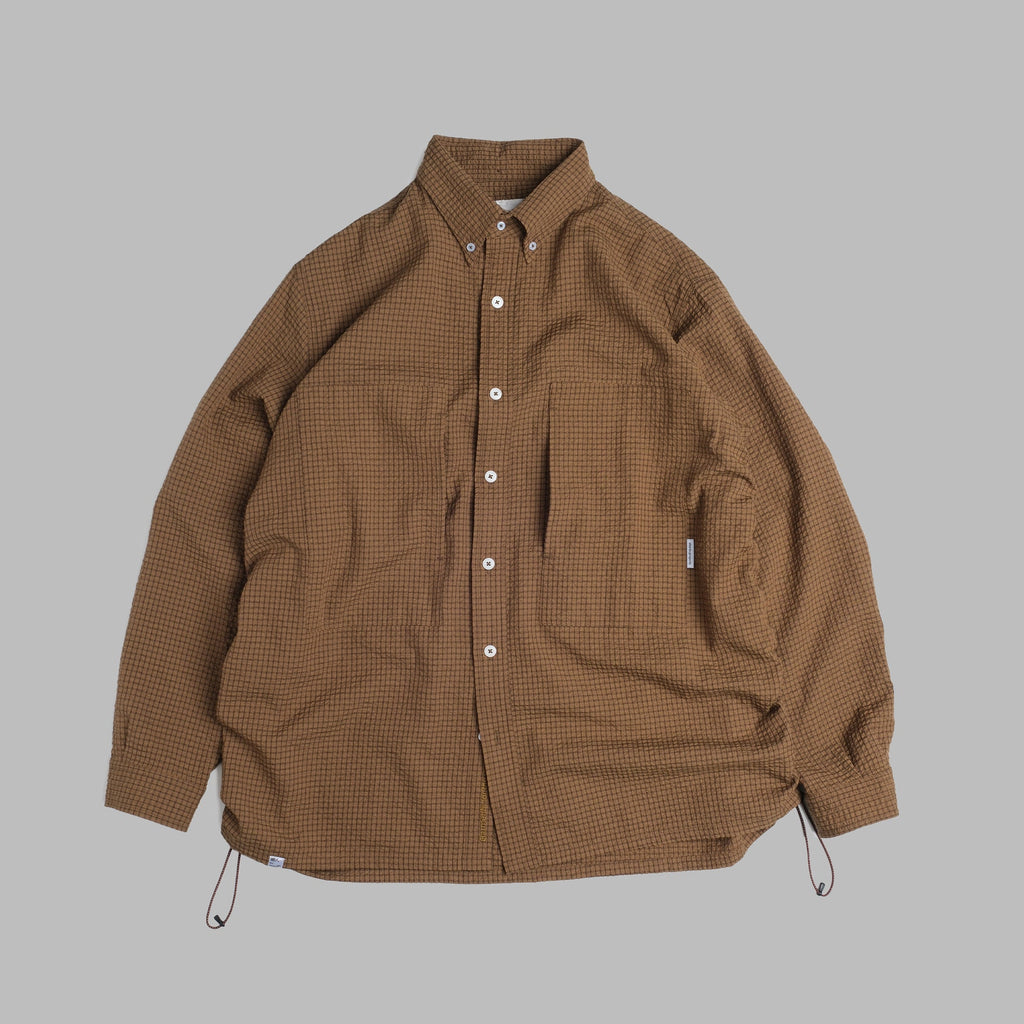 Brown checkered jacket on a gray background
